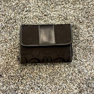 Black monogram canvas wallet with lots of card pockets